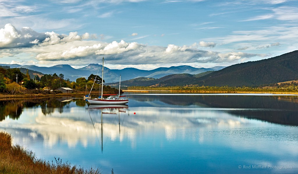 Clouds reflected on Huon River